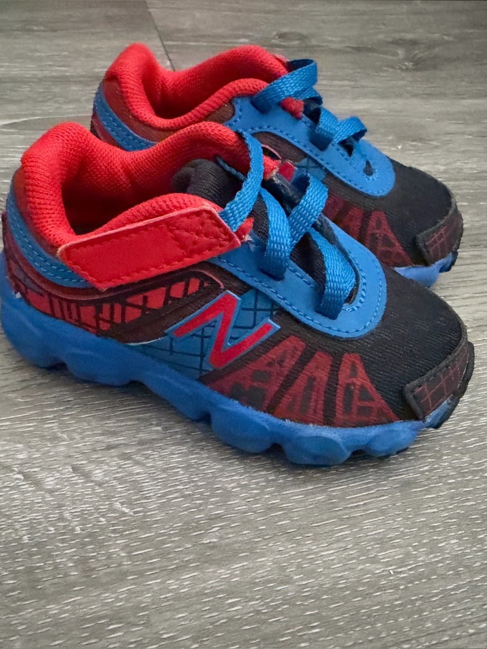 New Balance Kids Blue and Red Trail Sneakers